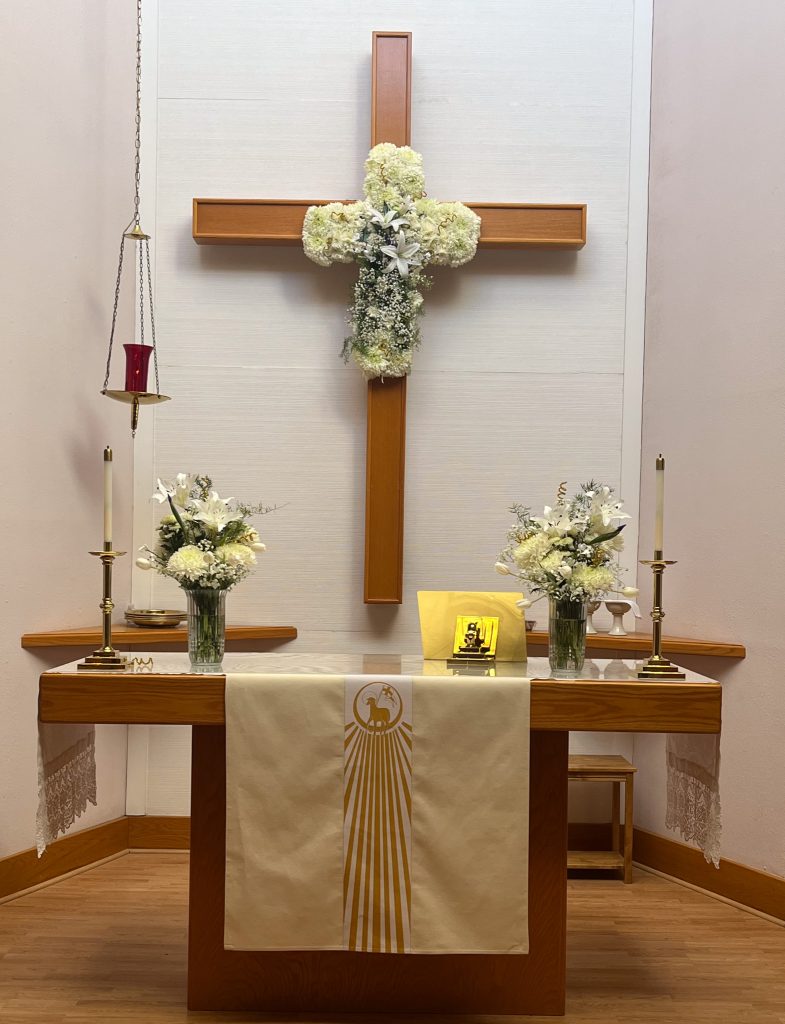 Altar decorations of white lilies and carnations
