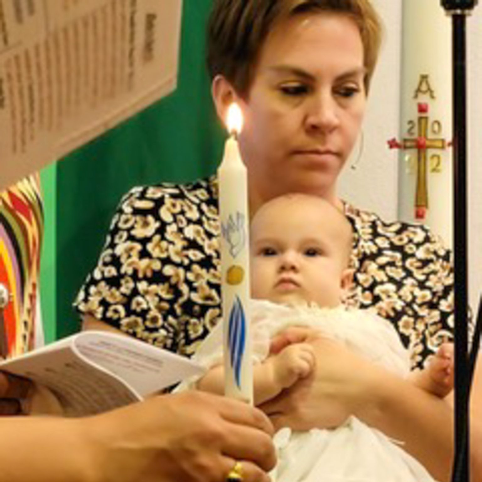 Mother and child at baptism.